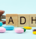 A child and adult showing early signs of ADHD such as difficulty focusing and restlessness