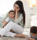Mother recognizing when to seek help for postpartum depression and emotional distress after childbirth