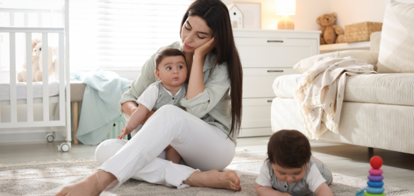 Mother recognizing when to seek help for postpartum depression and emotional distress after childbirth